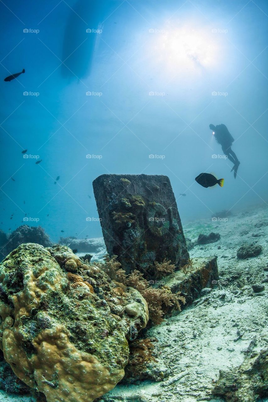 Diver and grave Stone