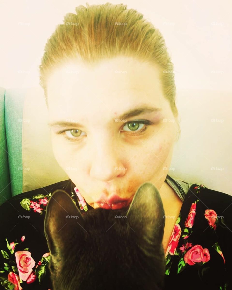 Cat kiss lips green flowers ginger sitting duck face eyes brows pets woman lady 