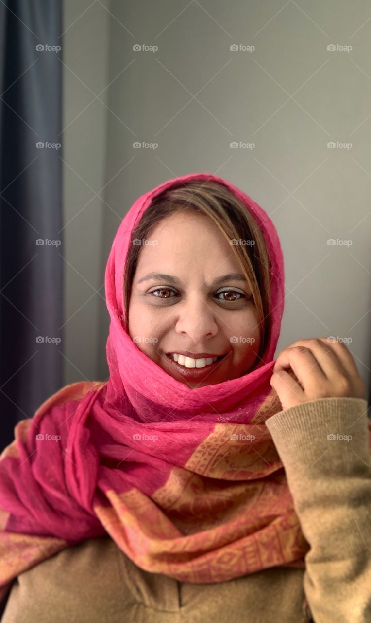 Indian woman in bright headscarf 