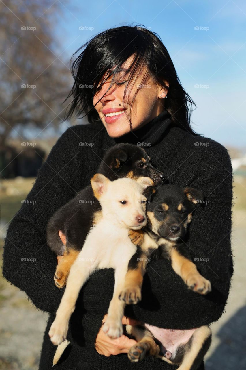 walking the dog, people walking the dogs on the street, they spend time together, the person plays with the dog, trains it, eat delicious food, take pictures. best friends are dogs. children and dogs for a walk