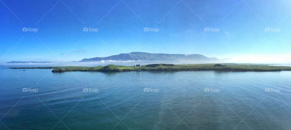 Small house in the morning fog