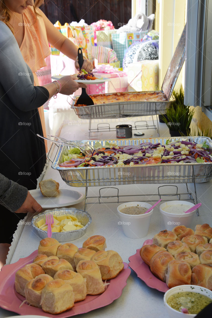 Party food line with gifts
