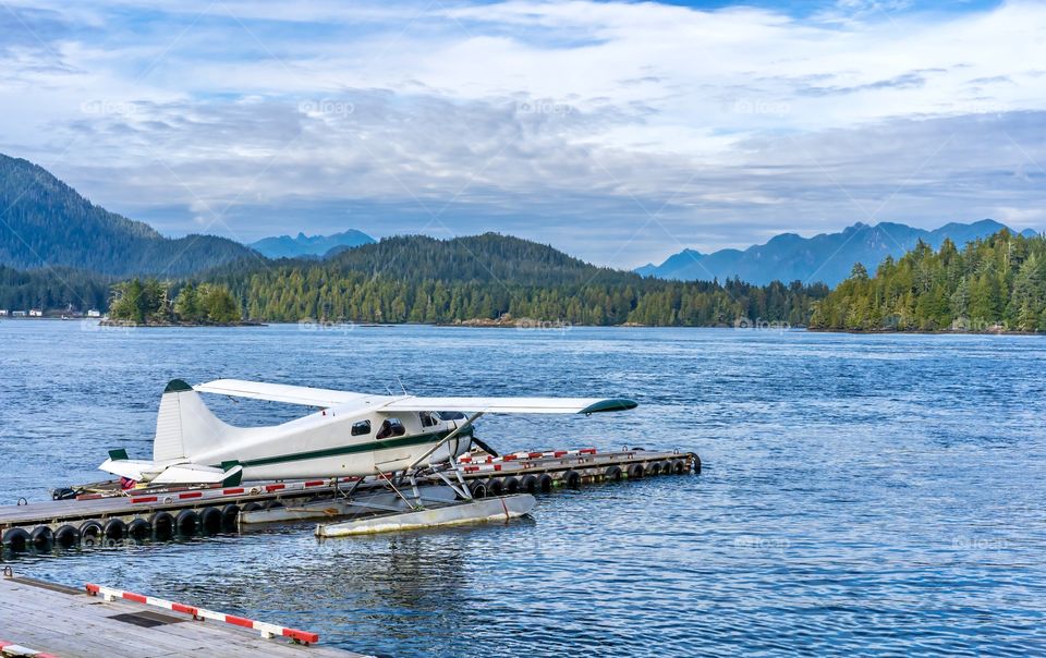 Float plane parked on the water of the pacific coast at Tofino, British Columbia, Canada 