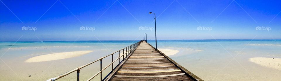 Walking along the Jetty in Summer time