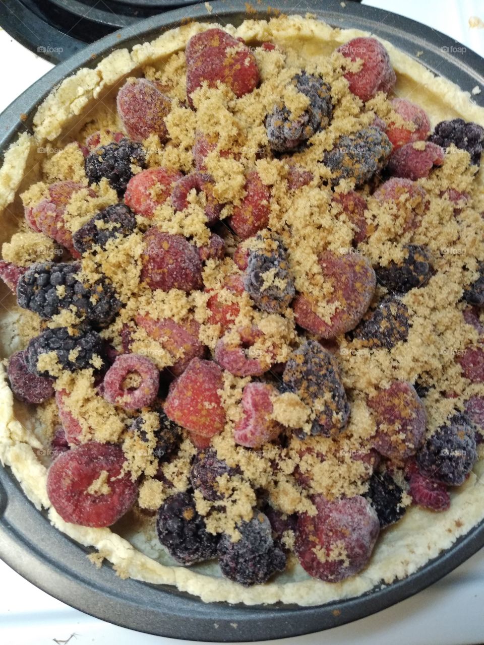 Homemade berry pie before going into oven
