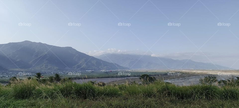 beautiful landscape with mountains and clouds