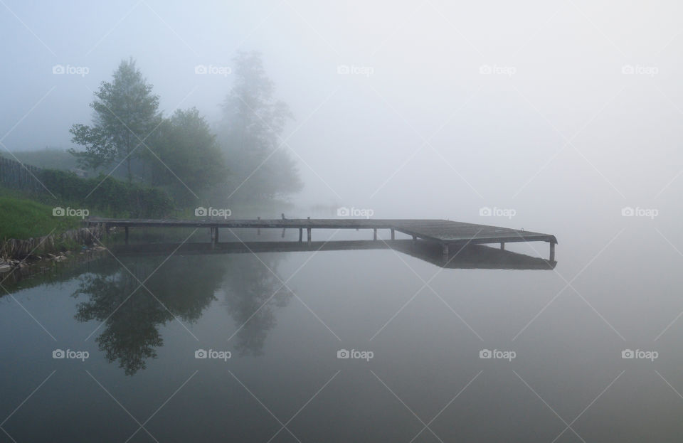 grey foggy morning in polish countryside