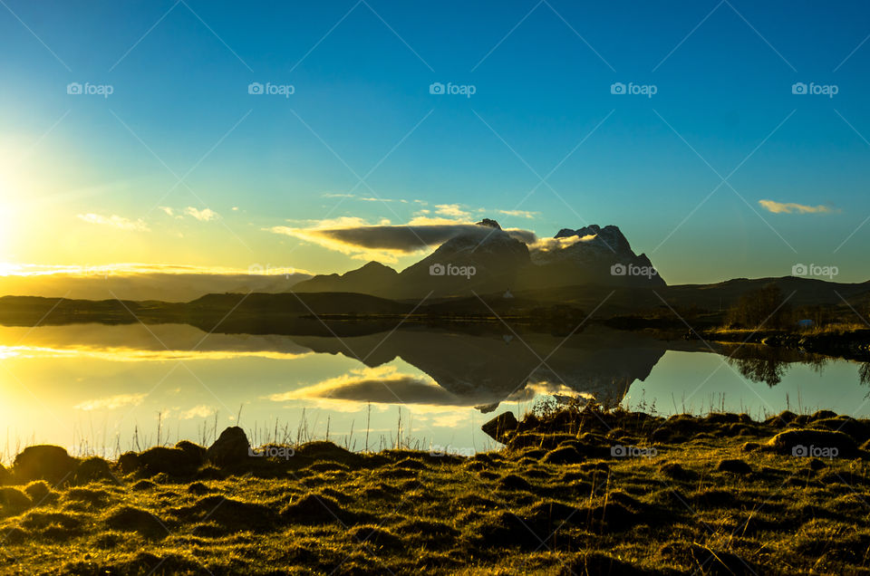 Reflection of mountain in a lake in Lofoten