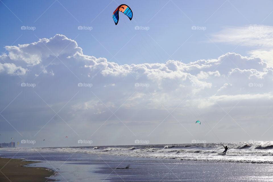 Kitesurfers at the beach in São Luís, Brazil