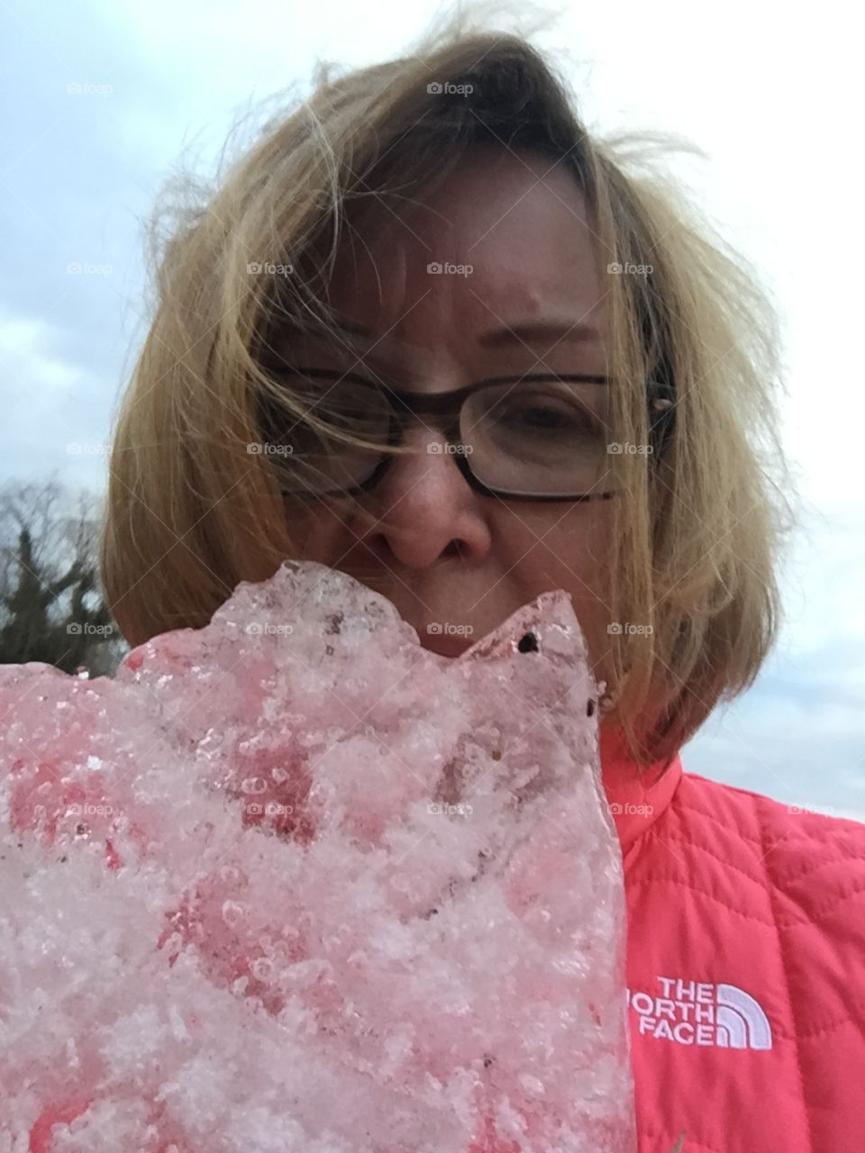 Huge Ice chunk from the Susquehanna river ice jam looks like a stawberry snow cone through my jacket