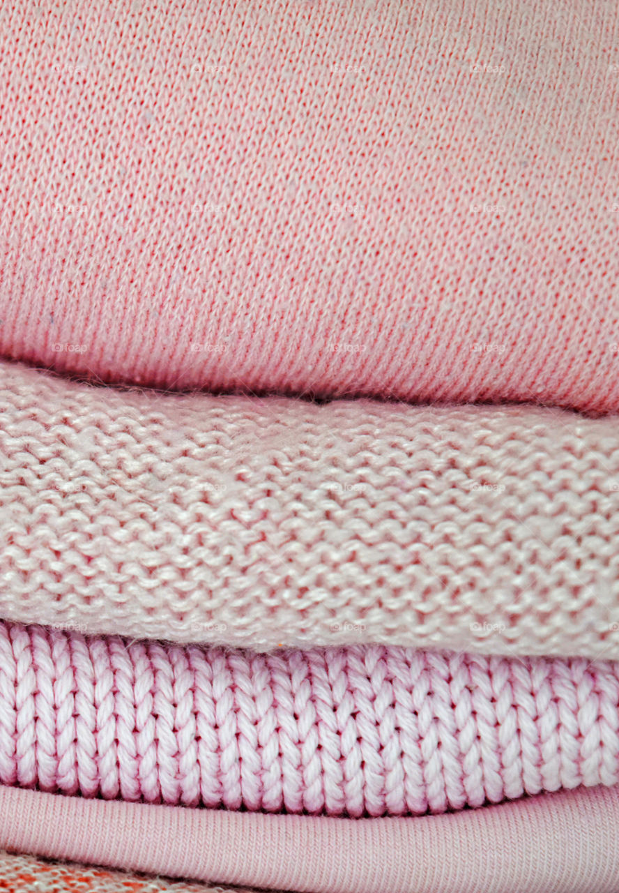 Stack of pink sweater