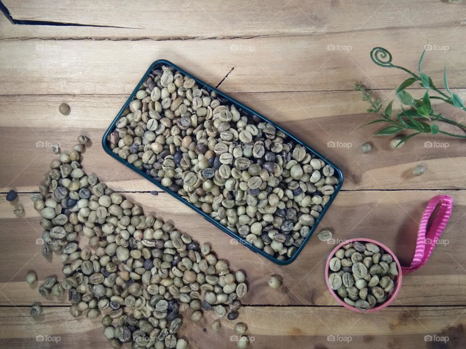 directly above of coffee beans on wooden table