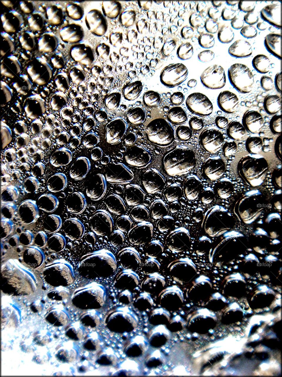 Silver water drops close up shoot colorful background summer feeling amazing liquid bubbles macro picture