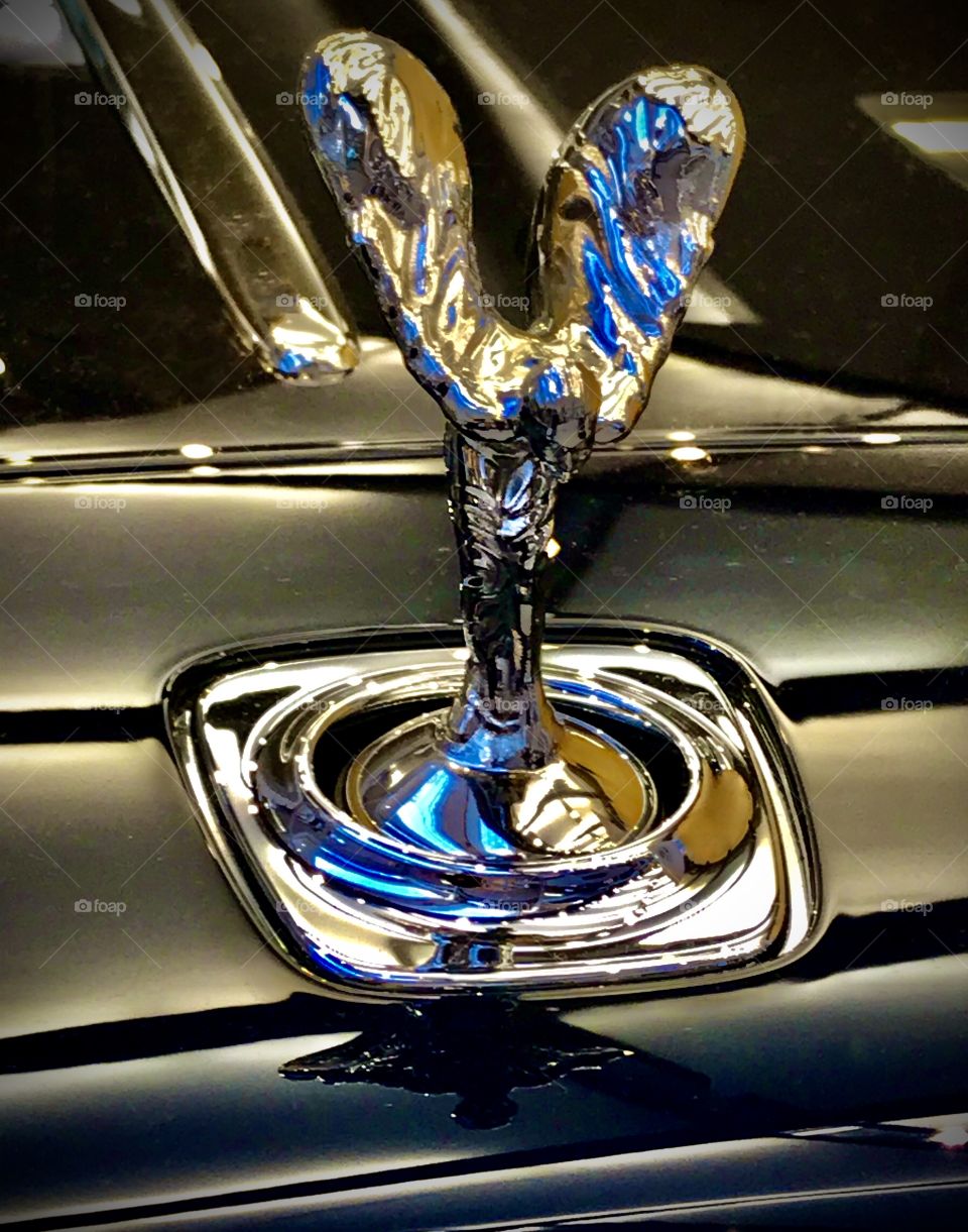 Shiny rolls Royce symbol