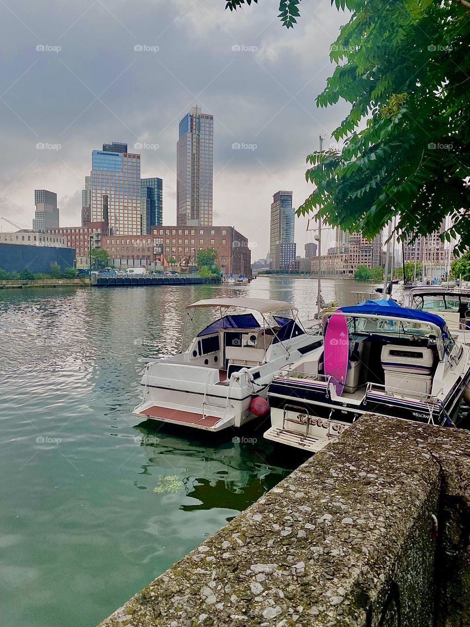 This intriguing area is “Newtown Creek” by the “Pulaski Bridge” in “Long Island City”, Queens. On an overcast day like this the ocean’s surface has a silvery sheen that makes it appear like glass. 2023. Hypnotic Productions