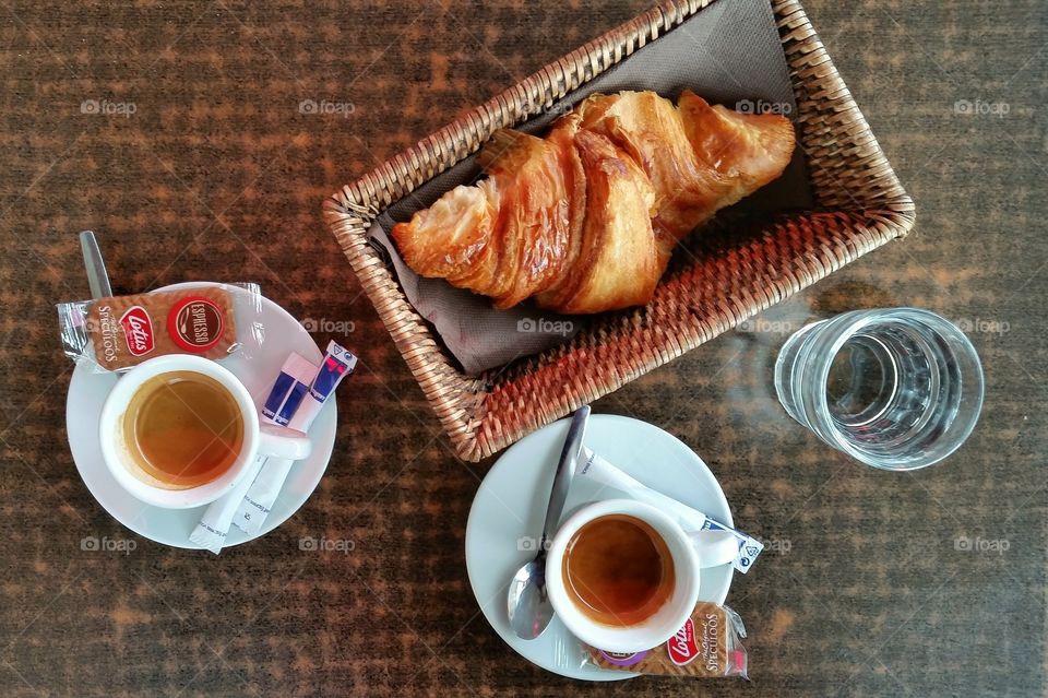 Espressos and croissant