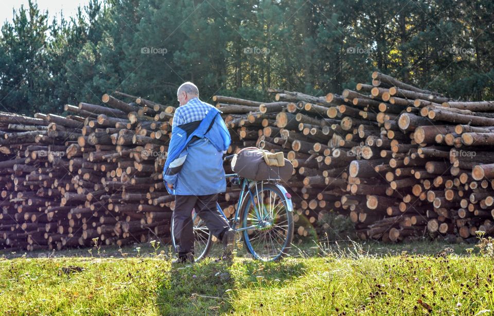 men with bike landscape, social distance