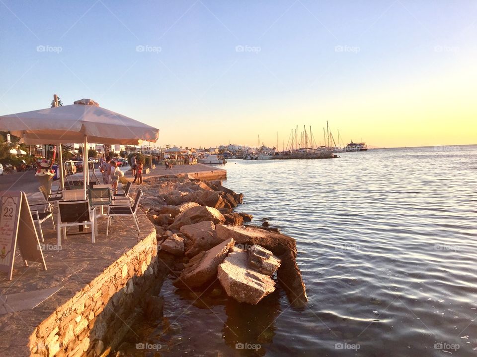 Beautiful sunset on beautiful Greek island, Paros at the dock