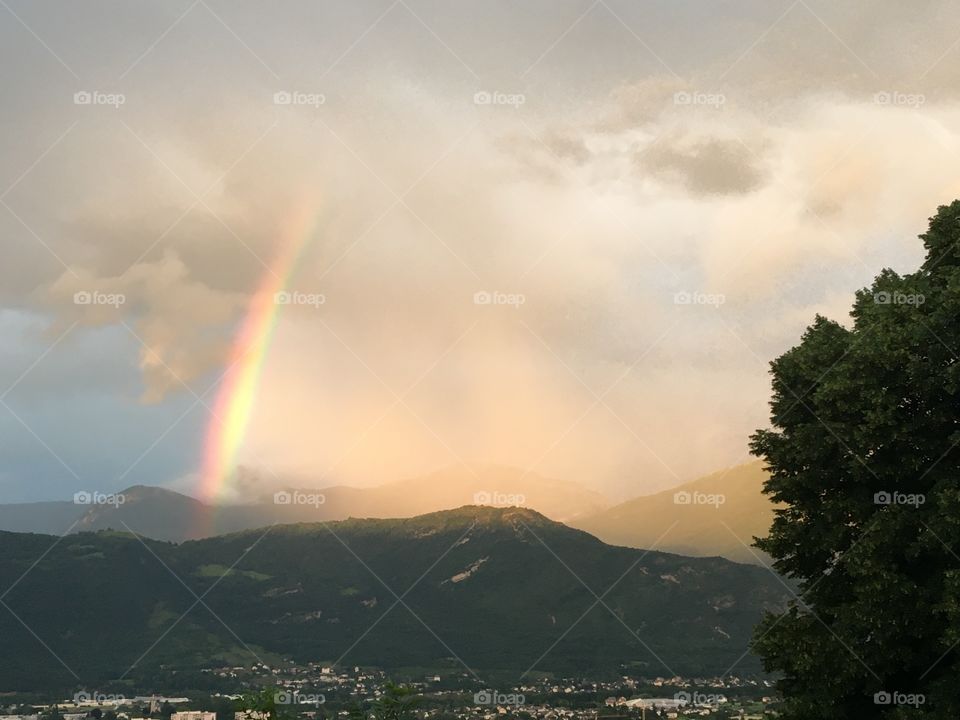 Beginning of a rainbow after stormy day