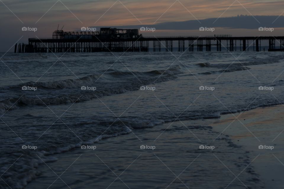 The sea at dusk, waves lap gently on the shore after the sun has gone down #nofilter, #truephotos