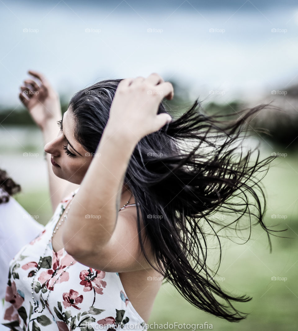 Woman's hair blowing with wind