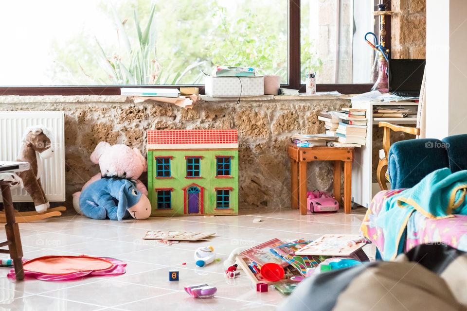 Messy Kids Play Room With Toys
