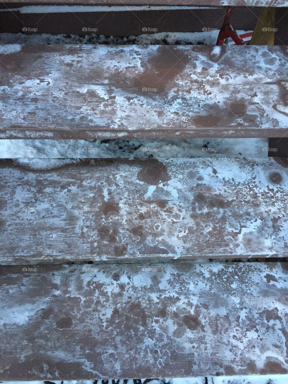 Ice melted off stairs with salt