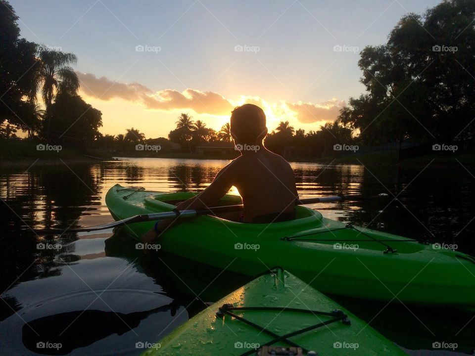 Sunset kayaking in the lake