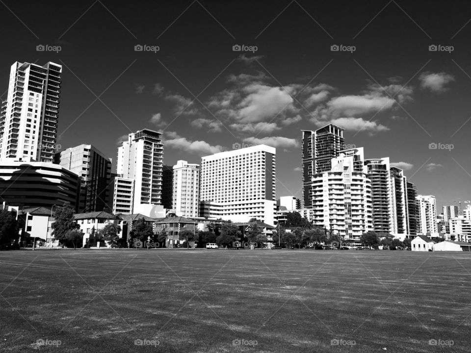 Monochrome image of cityscape can be seen various kinds of buildings, such as apartments, hotels and office buildings.