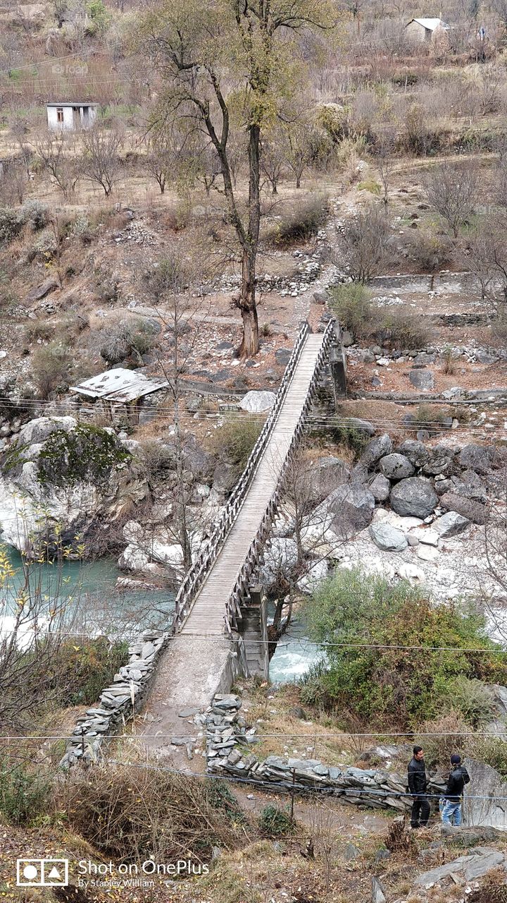 Village bridge on river
