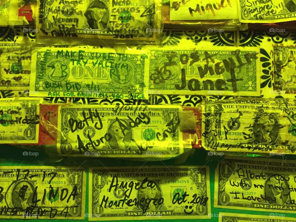 Restaurant in Mexico covered with signed $1 bills (my name is there)
