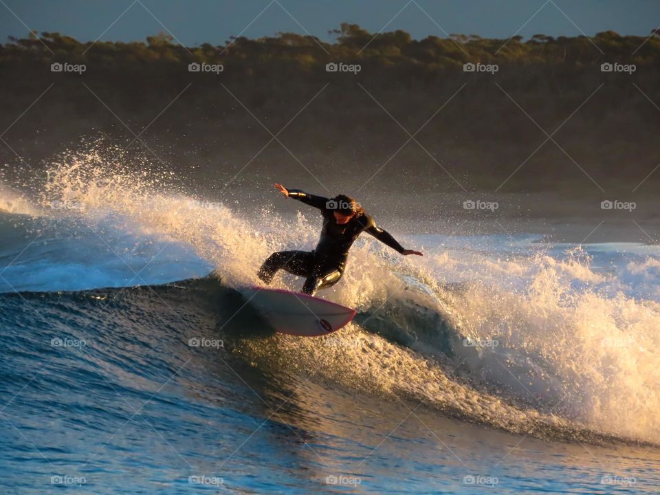 Sunset surfing