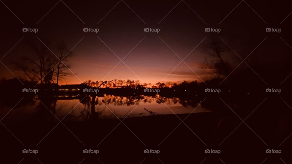 The Last shot of the Night. Dark sky Dark Landscape reflections on Lake Waters Colorful Hues makes for a Beautiful setting to End The Day.