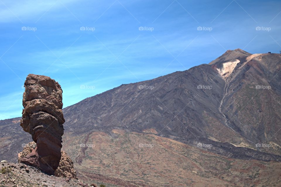 Roque Cinchado, a volcanic formation emblematic of Tenerife, is located 1700 meters below the summit of Teide but still at 2000 m above the sea level.