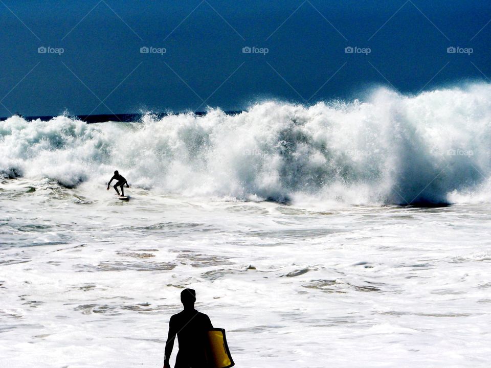 Body boarders braving the big waves. Body boarders braving 10-15 foot waves at The Wedge in Newport Beach