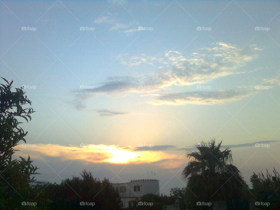 Sunset in a village of the Italian island of Ischia on a May day