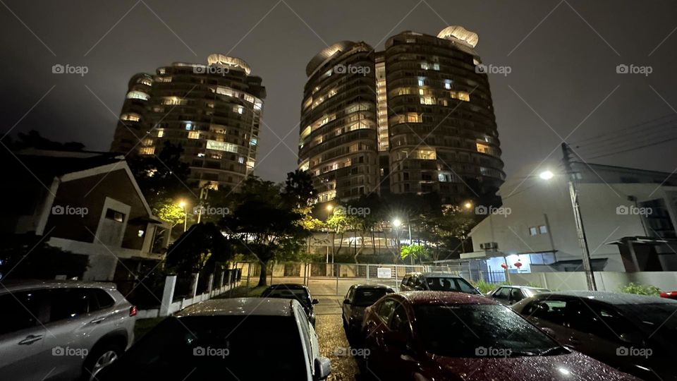 Apartment block and car park at night