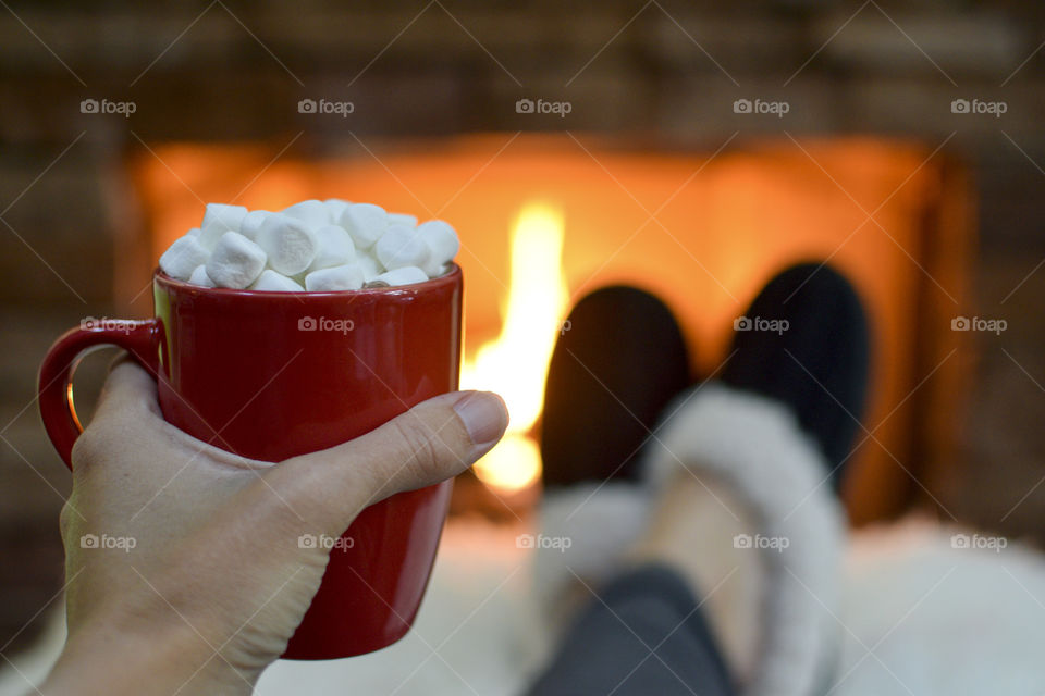 Relaxing in Front of the Fire with a cup of hot chocolate 