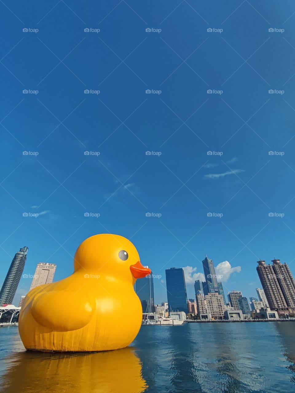Rubber Duck floating on Love River Bay in Kaohsiung, Taiwan