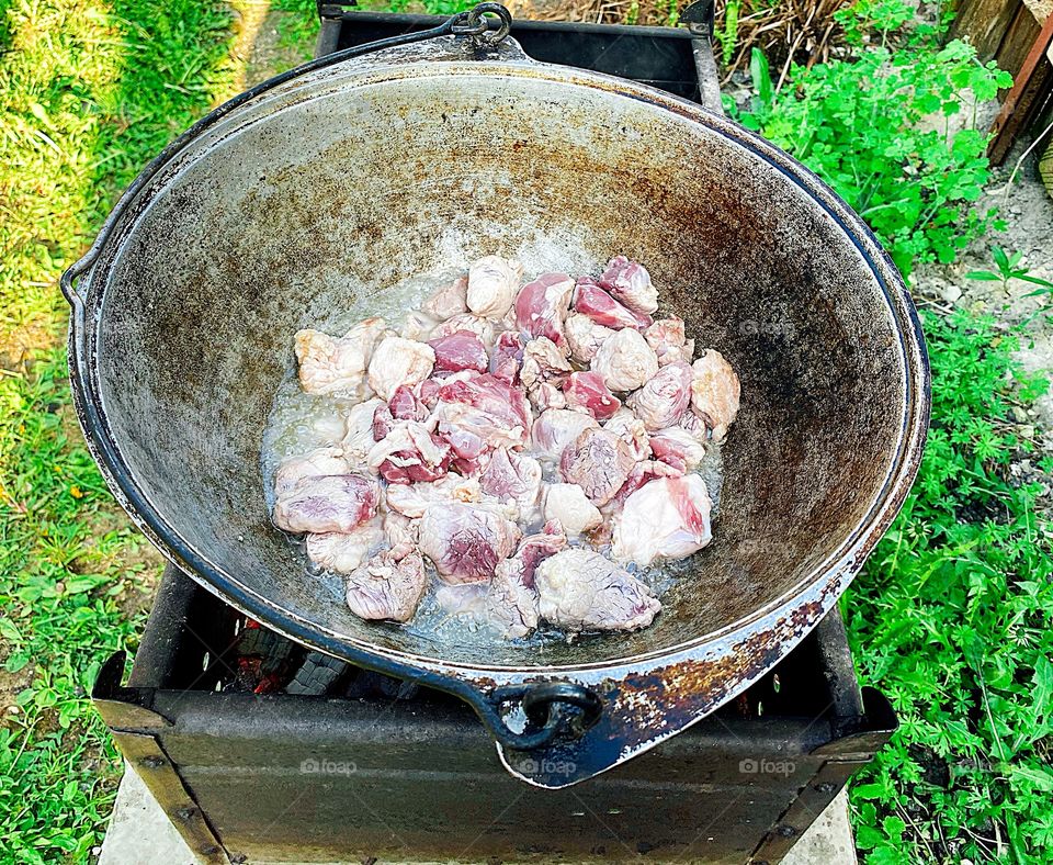 Cooking food on the campfire