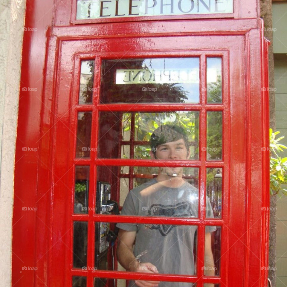 BOY IN PHONE BOOTH
