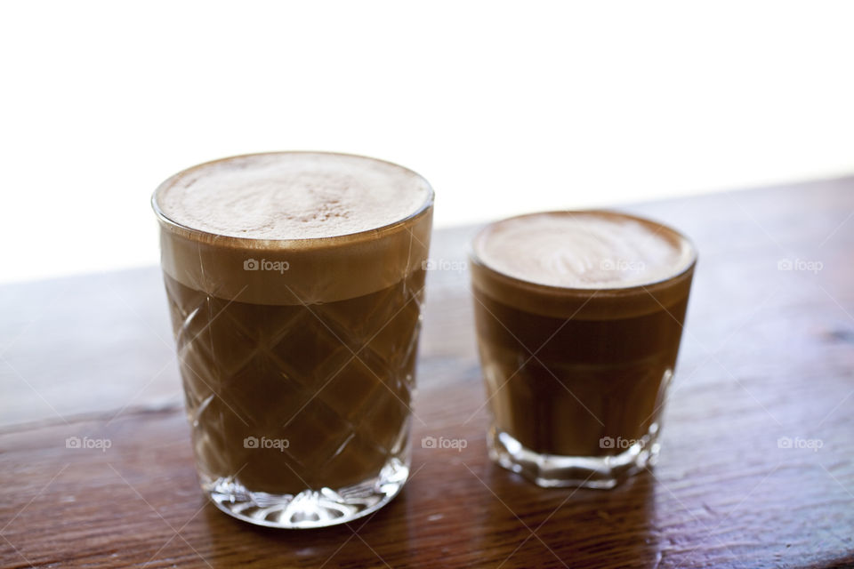 Glass of coffee on table