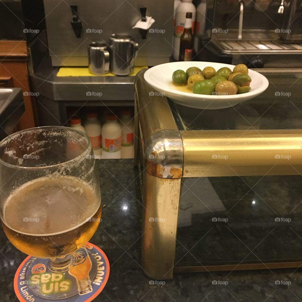 Tapas times with beer and olives 