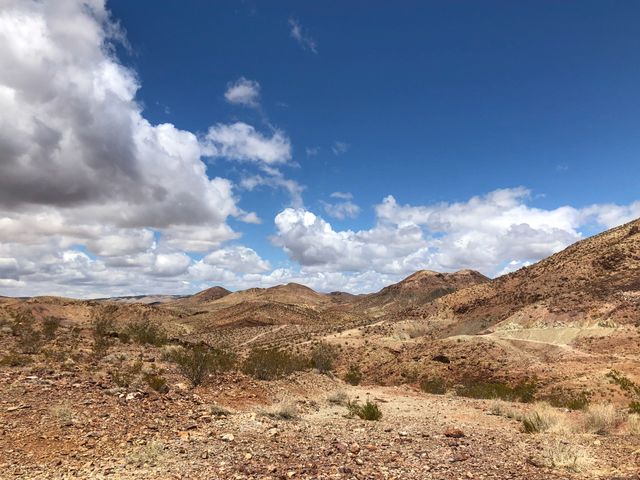 Dry rolling hills with popcorn type clouds