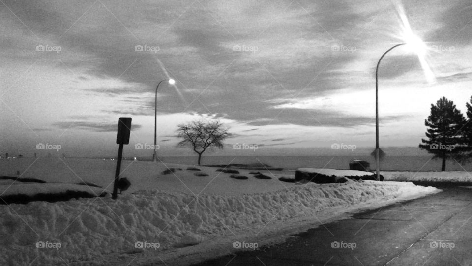 black and white clouds water sad snow