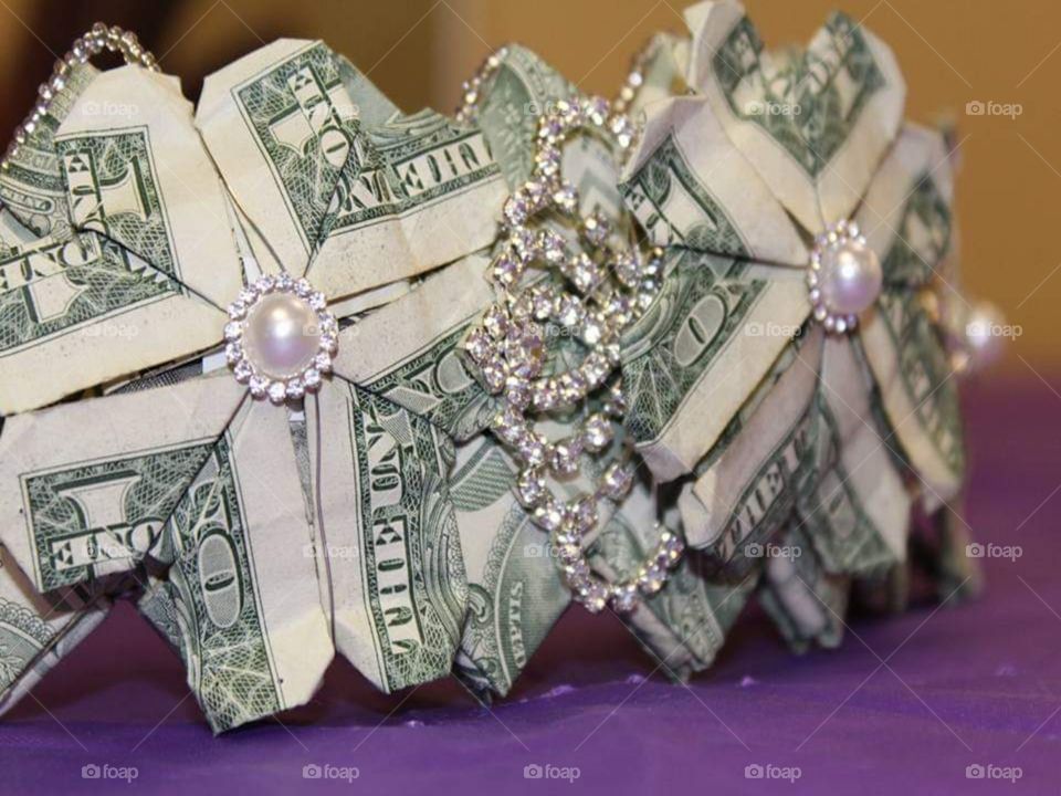 Side view of the crystal accented money crown