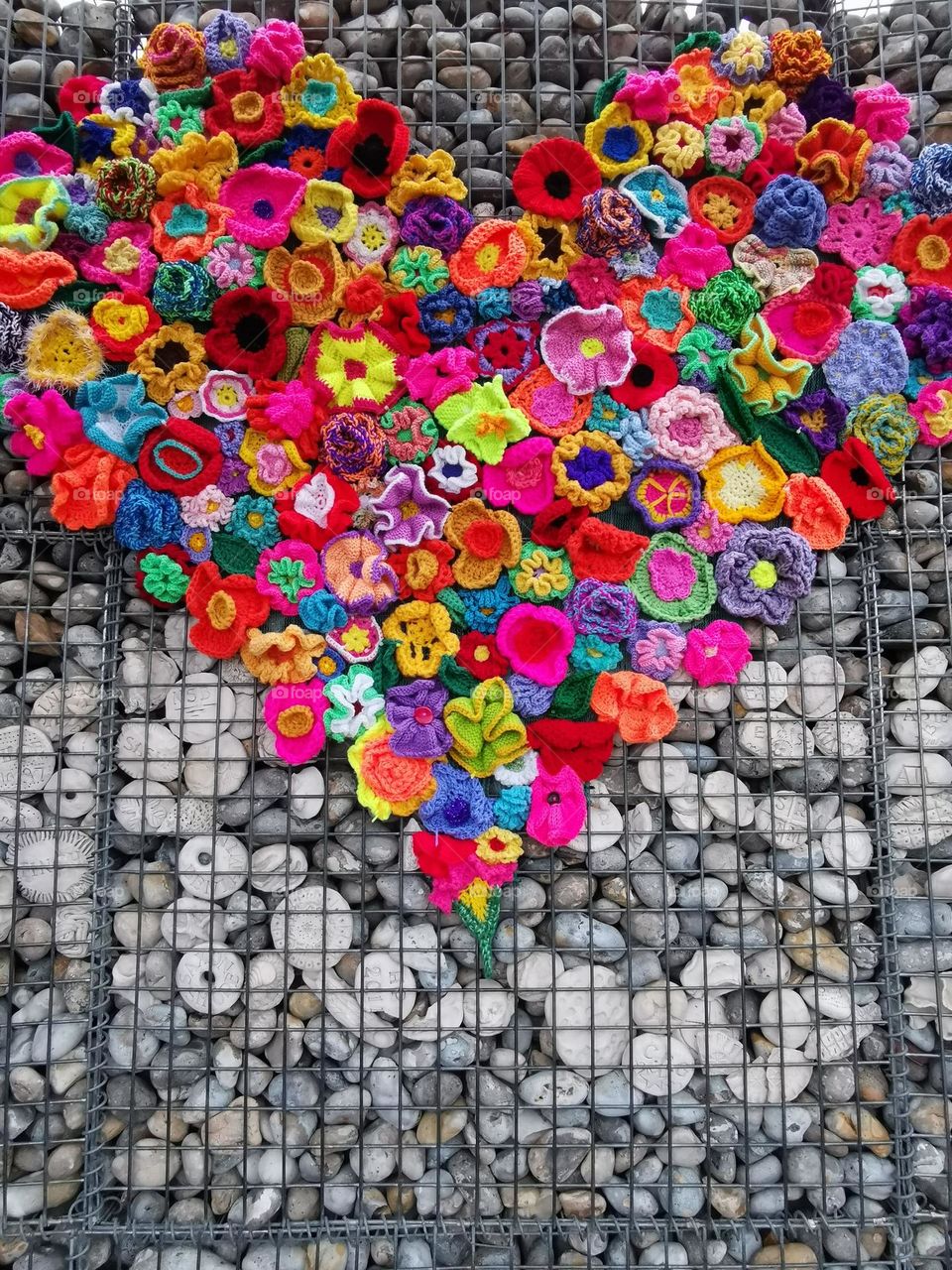 Visual street art. Colourful knitted heart.