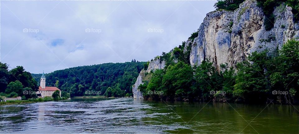 The “Danube” undulates alongside cliffs on its way from “Kelheim”, Bavaria, then takes two sharp turns into a half loop with a small sand beach called the “Donaudurchbruch” or “Danube Gorge” at the “Weltenburg Abbey”. 2024. Hypnotic Productions