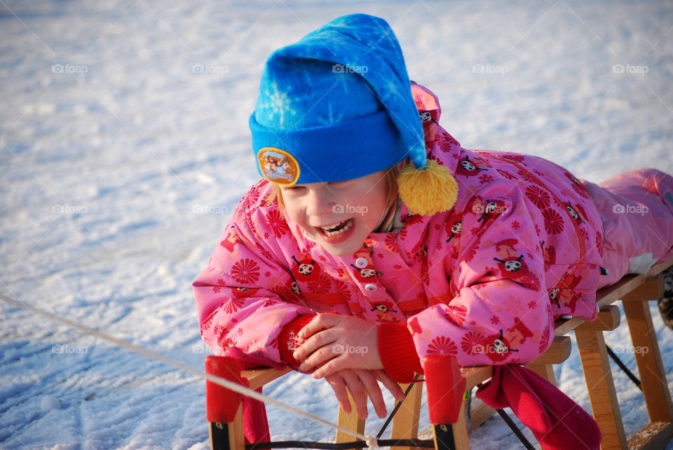 Child having fun on ice