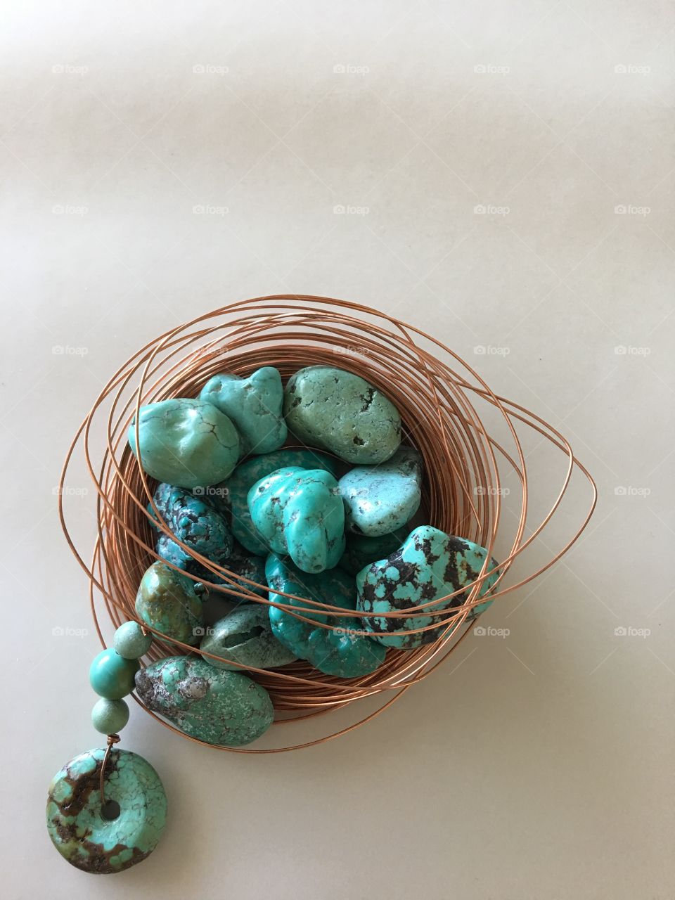 Wire surrounding beads for crafting 